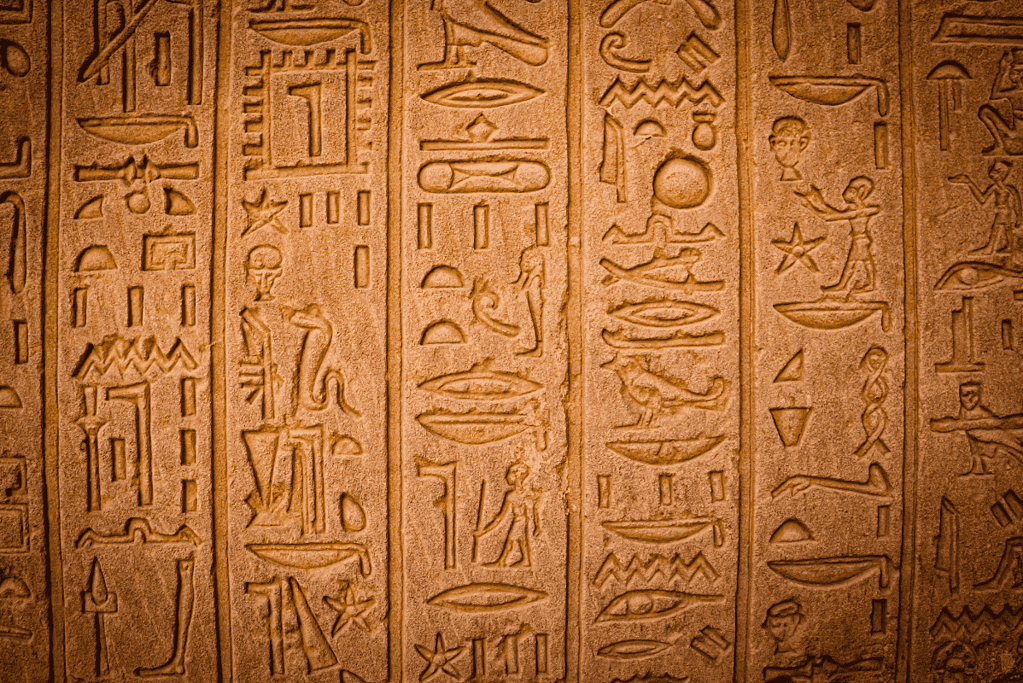Image of ancient Egyptian hieroglyphics carved into stone