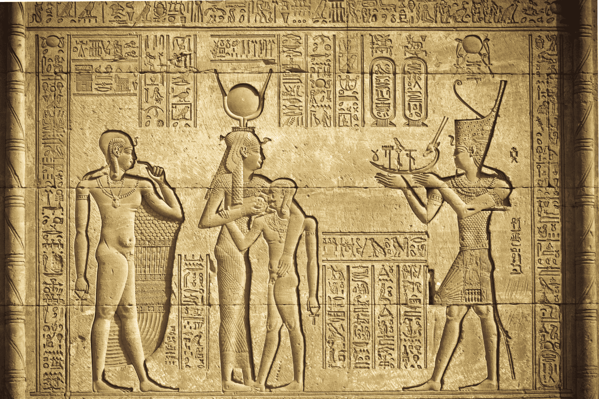 Image of ancient egyptian gods carved into sandstone