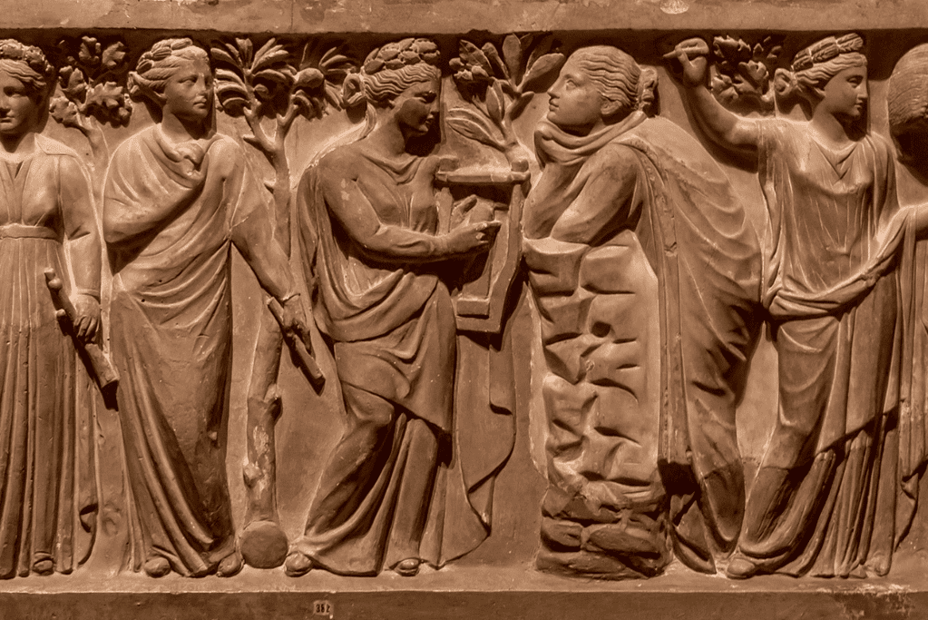 Image of a wall relief depicting life in ancient Greek city states