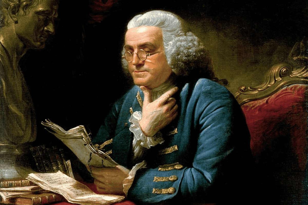 Image of a painting of inventor and statesman Ben Franklin reading