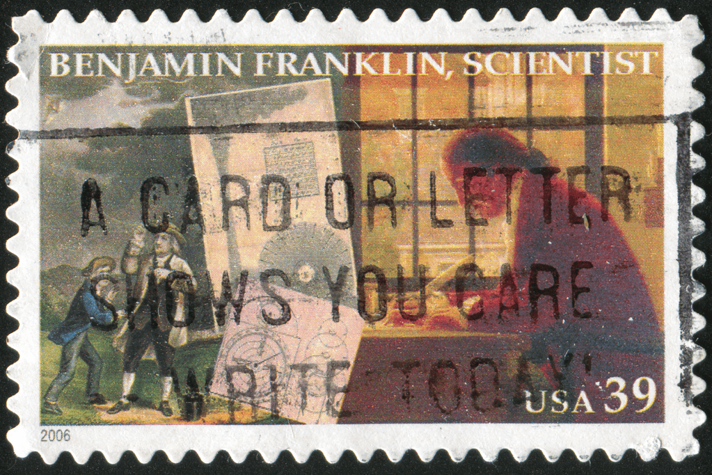 Image of a postage stamp honoring Ben Franklin's work as a scientist and inventor