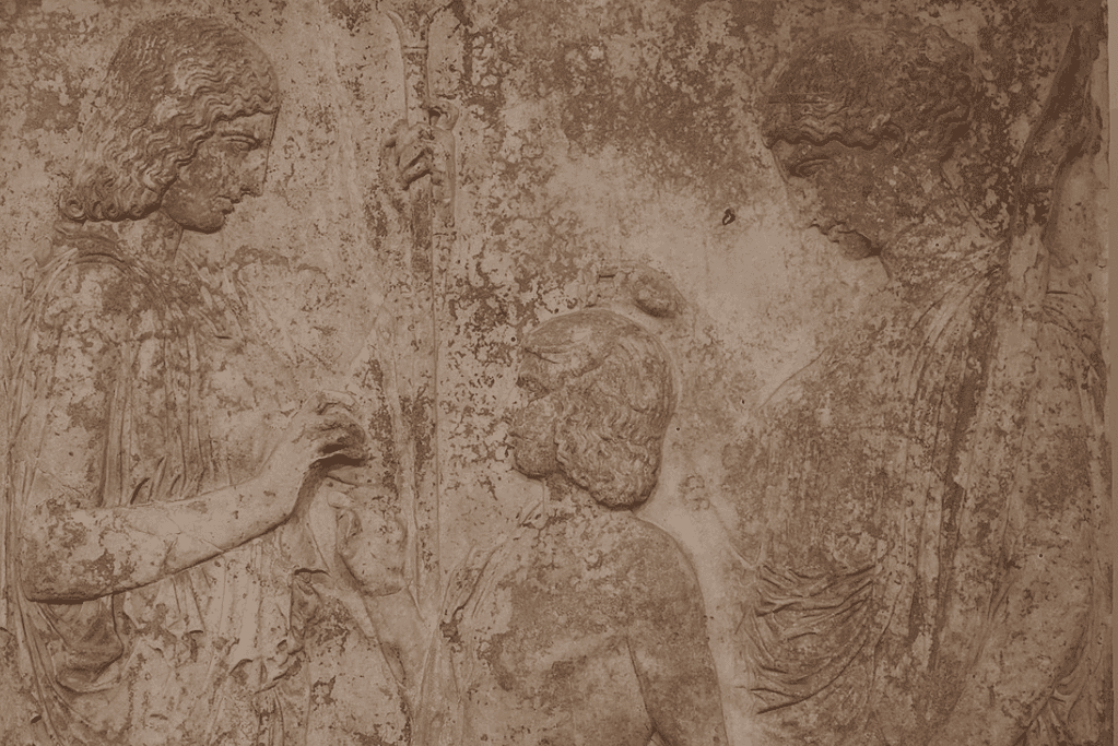 Image of a stone relief with the greek goddess demeter depicted on the right