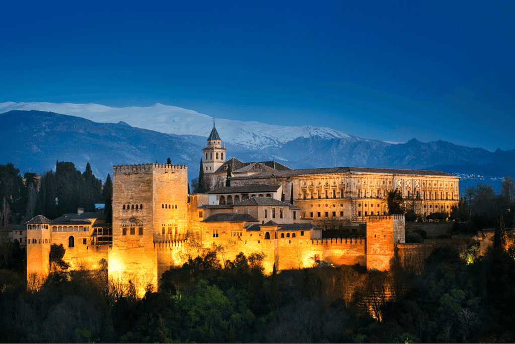 Image of the Alhambra palace and fortress in Grenada at night.