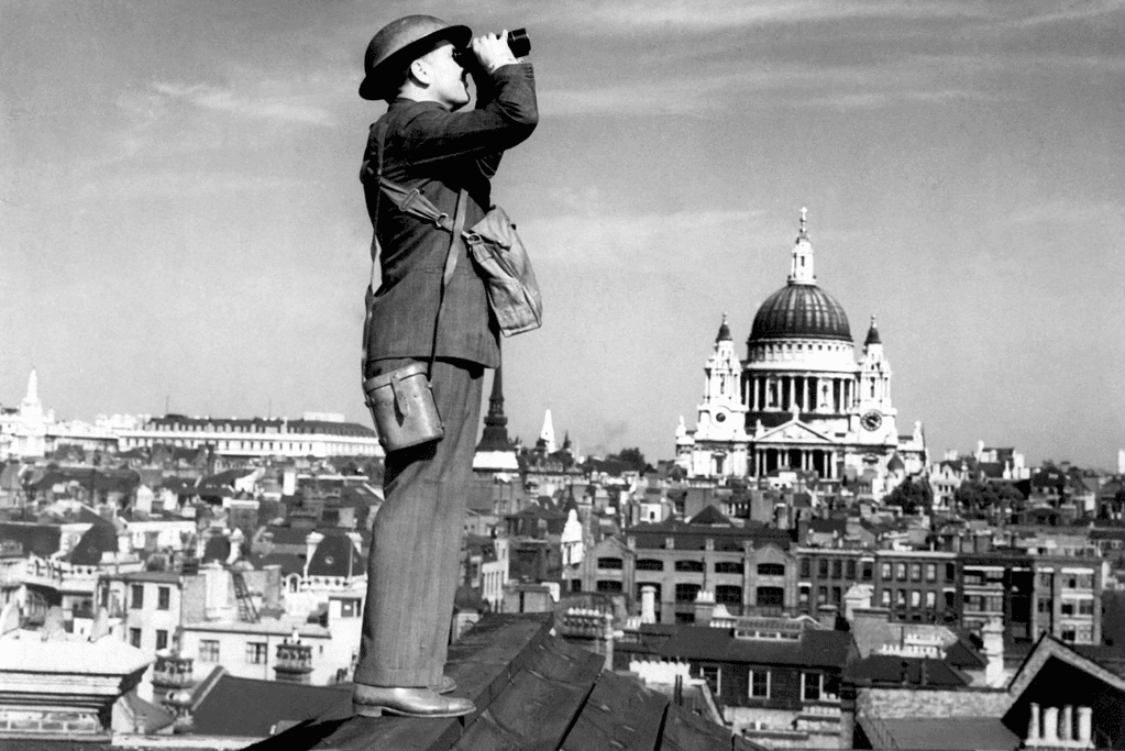 Image of a British volunteer scanning the sky for German planes during the Battle of Britain