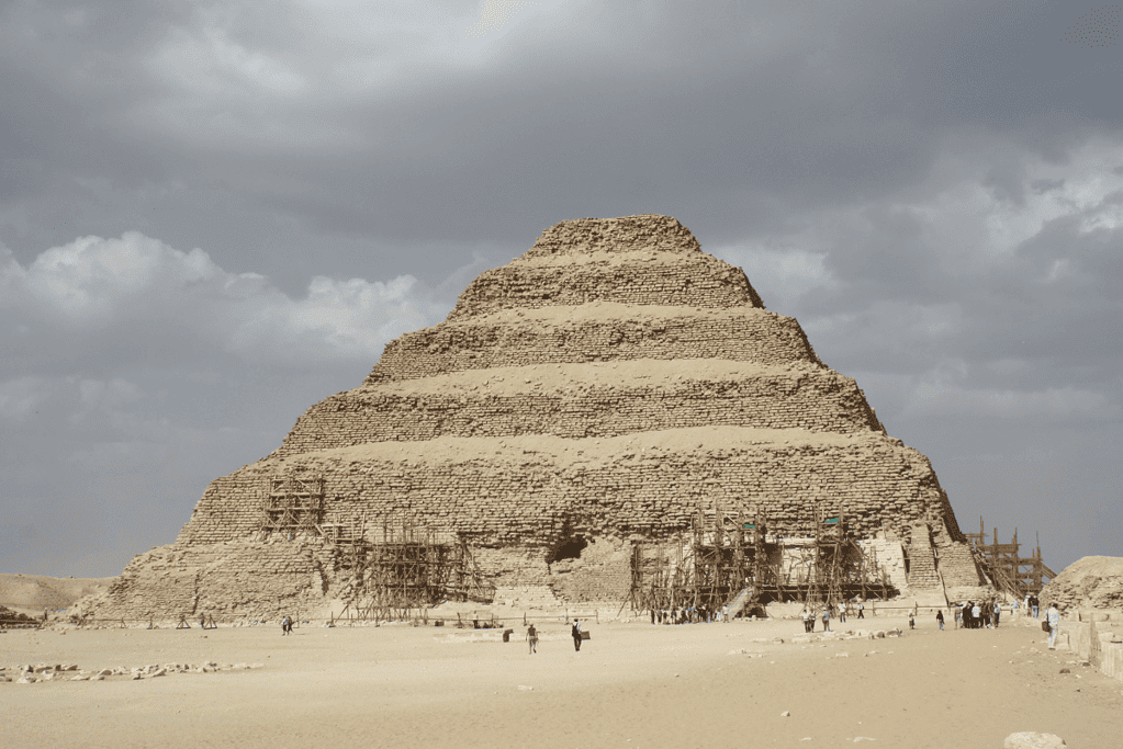 Image of the step pyramid of Djoser, one of the earliest monumental structures built by the pharaohs of ancient Egypt.