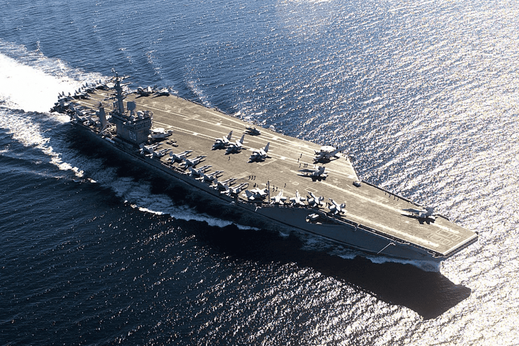 The Aircraft carrier USS Nimitz (CVN-66) at sea Image of the one of the larges warships ever built, the USS Nimitz