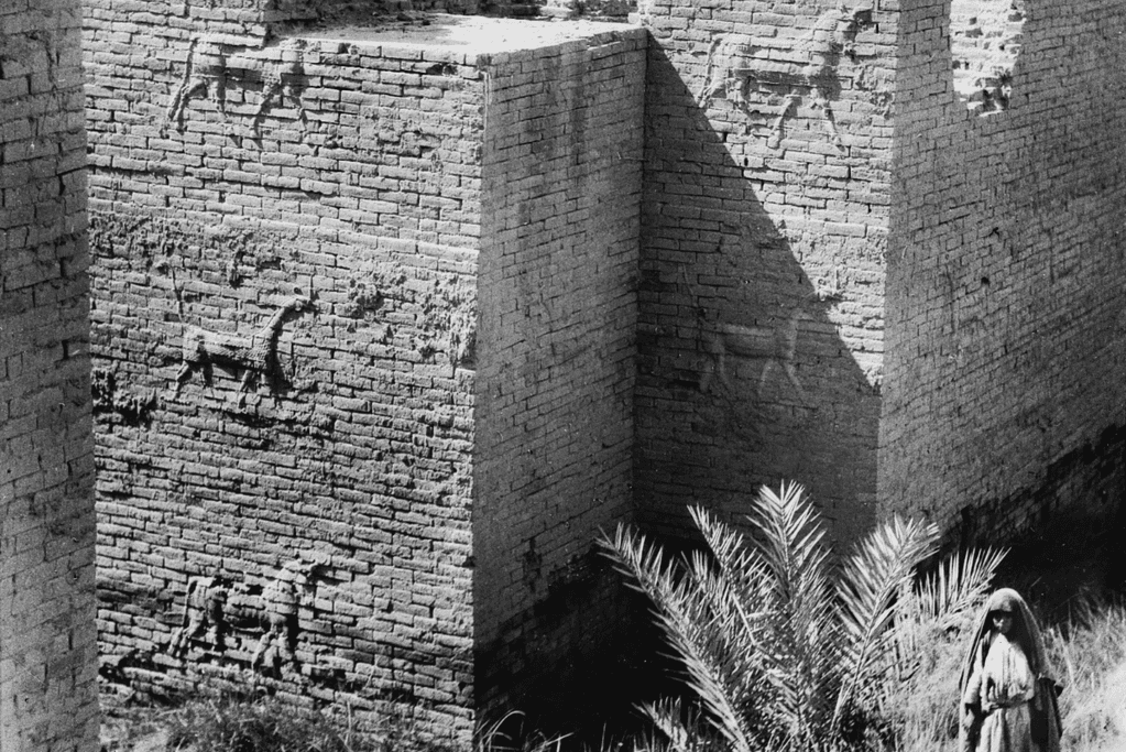 mesopotamian-kings-faqs Image of the ruins of the walls in vicinity of the Ishtar Gate, in Iraq (photo ~1932) for a blog post covering key Mesopotamian kings.