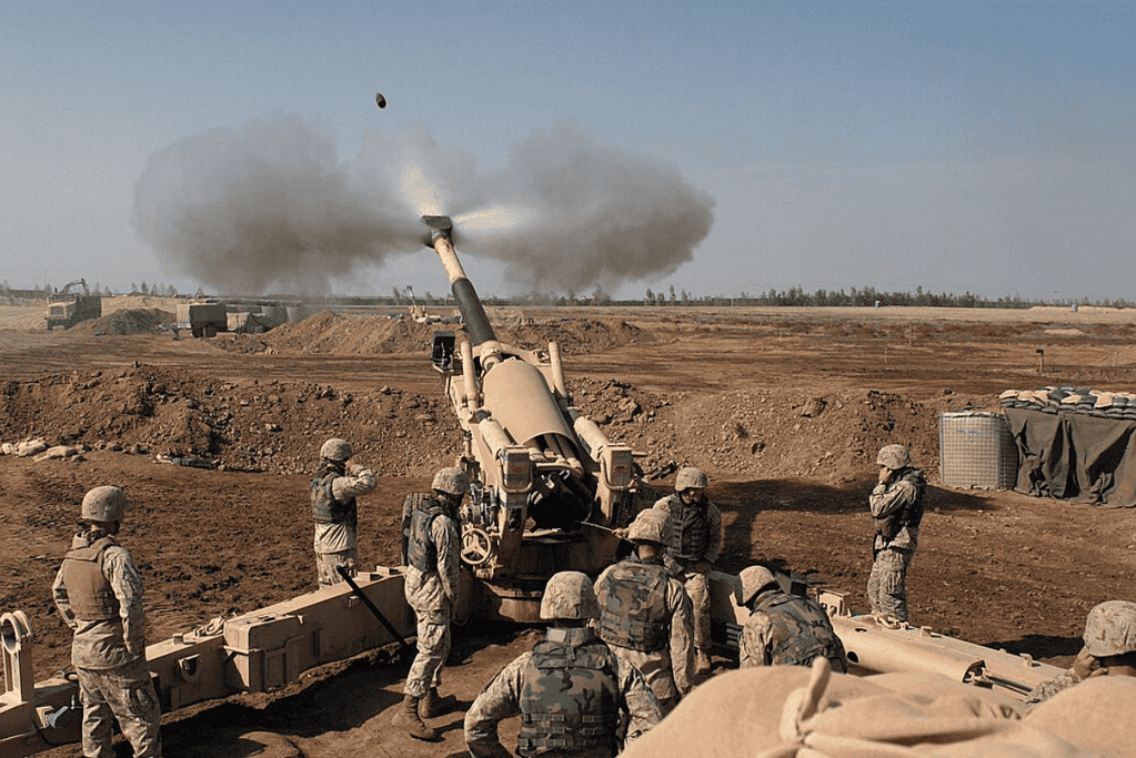 Image of U.S. Marine artillery firing on enemy positions at the Battle of Fallujah