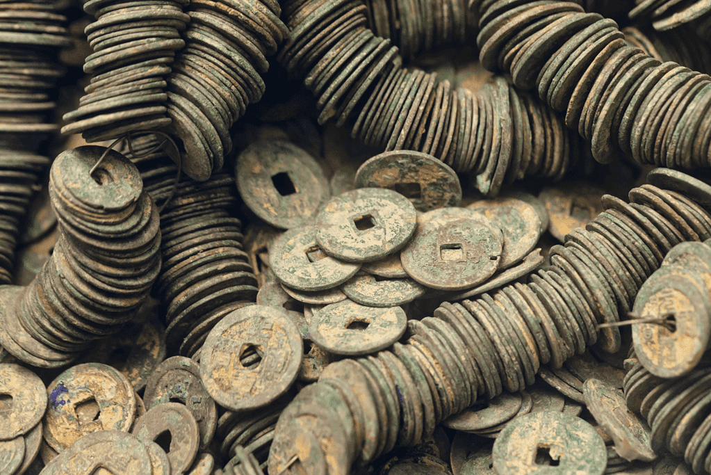 Image of stacks of Song era coins, representing a significant era in China's dynasty list, showcasing its economic and cultural heritage.