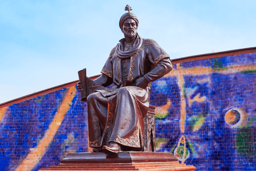 Image of a statue of Ulugh Beg, one of the famous astronomers, depicted holding a celestial chart