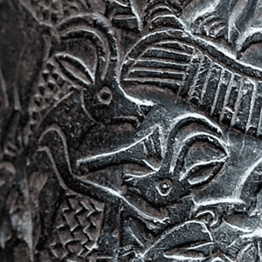 Image of a stone carving depicting a battle related to Mesopotamian mythology: Image Credit: https://commons.wikimedia.org/wiki/User:Neuroforever