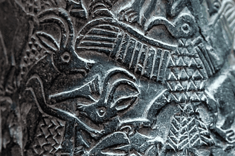 Image of a stone carving depicting a battle related to Mesopotamian mythology: Image Credit: https://commons.wikimedia.org/wiki/User:Neuroforever