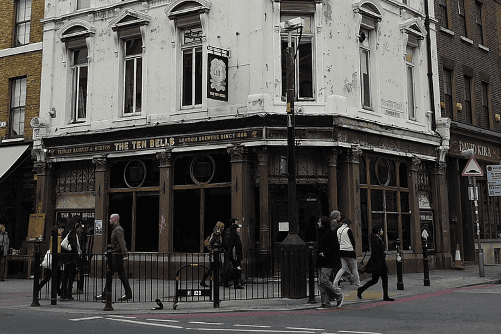 Image of the exterior view of The Ten Bells Pub, with its vintage façade and bustling ambiance, a poignant landmark in the chilling narrative of Jack the Ripper's spree.