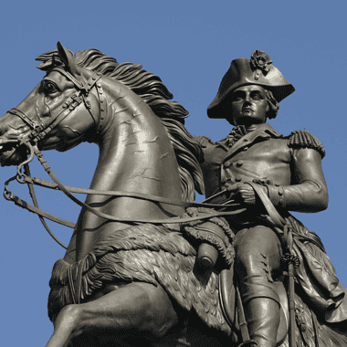 Image of a bronze statue depicting General George Washington mounted on a horse, symbolizing his pivotal role in the significant battles of the American Revolution.