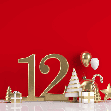 Image of a number 12 with Christmas decorations for a blog post covering the history of the 12 days of Christmas gift list.