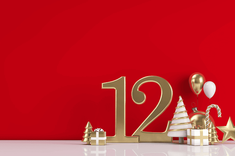 Image of a number 12 with Christmas decorations for a blog post covering the history of the 12 days of Christmas gift list.