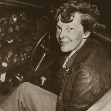 Image of legendary pilot Amelia Earhart in the cockpit for an article covering interesting facts about Amelia Earhart.
