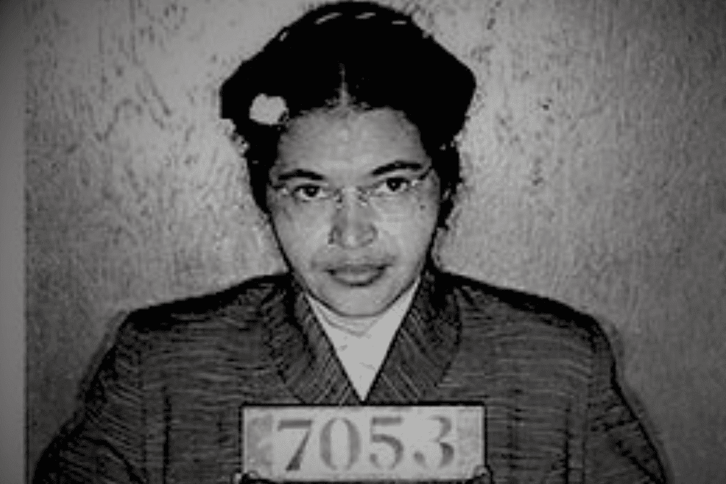 Image of Rosa Parks' booking photo from her arrest after her bus protest in Montgomery, Alabama for an article covering 10 interesting facts about Rosa Parks.