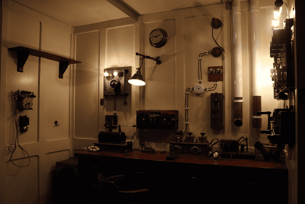 Image of a faithful reproduction of the Marconi wireless room on the Titanic, showcasing the historical significance of maritime communication.