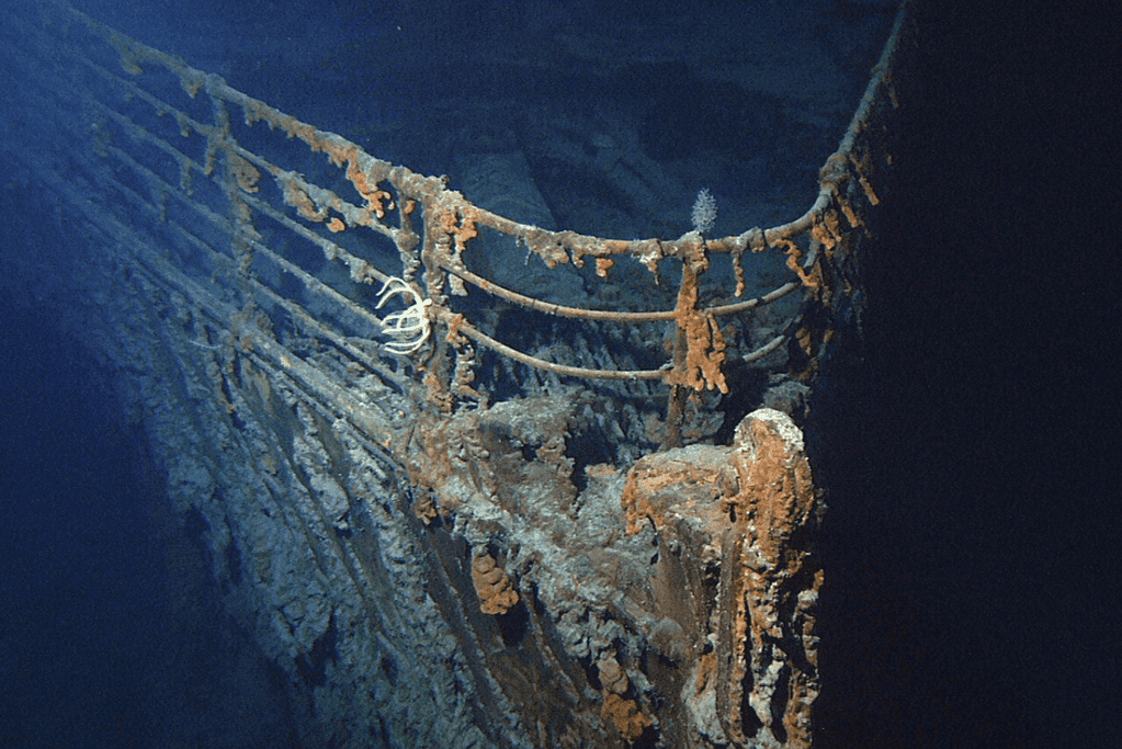 Image of the bow section of the sunken Titanic, located by Robert Ballard and his team in 1985, providing a poignant look at the iconic shipwreck.