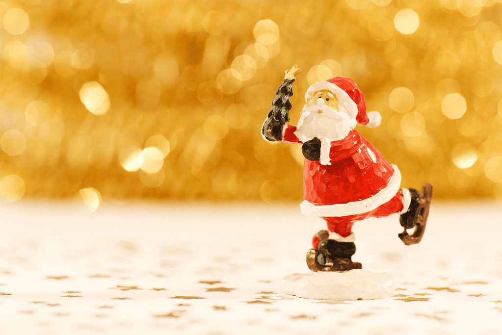 Image of a Santa Claus figuring ice skating for a blog post covering ten names for Santa Claus from around the world.