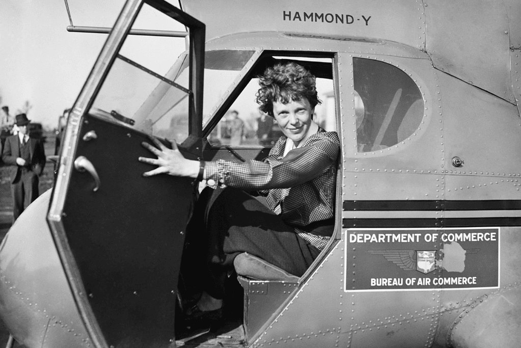 Image of Amelia Earhart in the cockpit of a U.S. govenment aircraft in 1936 for an article covering interesting facts about Amelia Earhart.