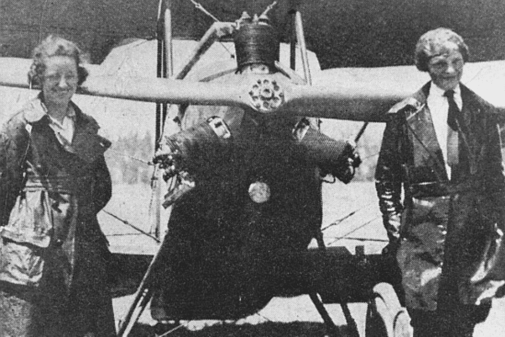 Image of Amelia Earhart (r) in the early days of her flying career for blog post discussing intertesting facts about Amelia Earhart.