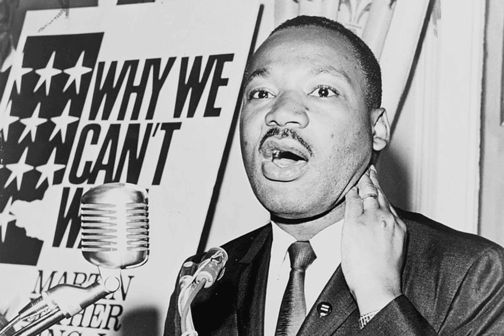 Image of MLK delivering remarks about the civil rights movement.