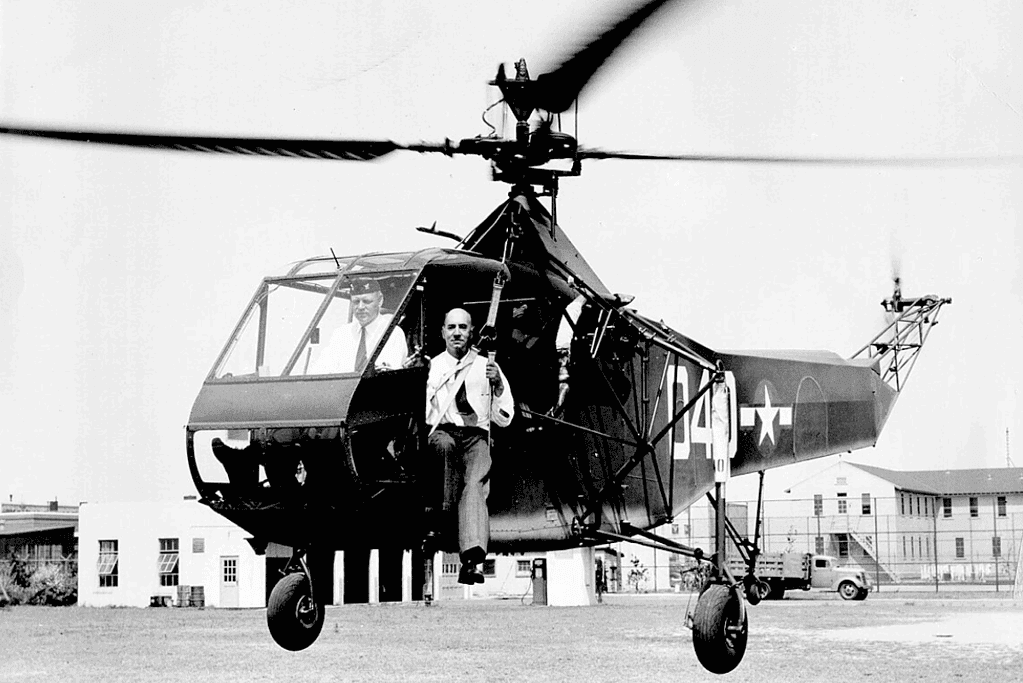 Igor Sikorsky flying an early helicopter in 1944, the aviation pioneer who created the first practical single-rotor helicopter