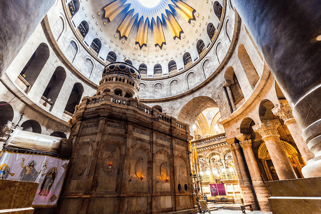 Image of the inside of the Church of the Holy Sepulcher in Jerusalem for a blog post covering biblical sites in Israel.