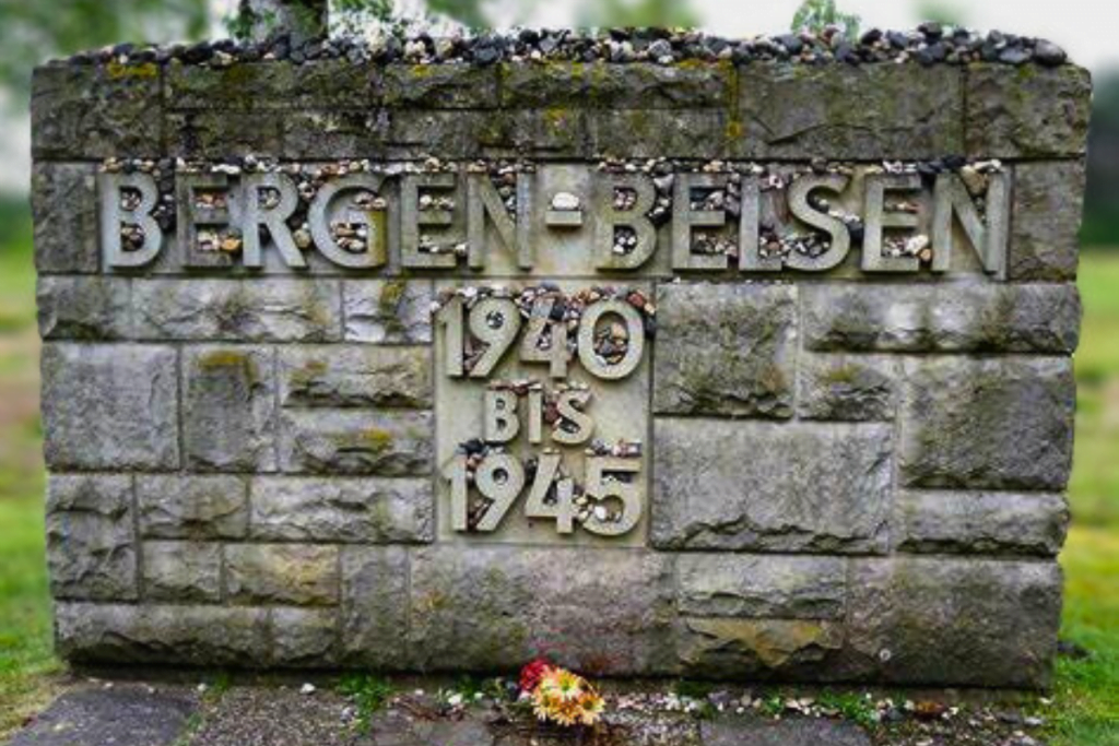 Image of a stone memorial at the Bergen-Belsen concentration camp, where Anne Frank died in March 1945.