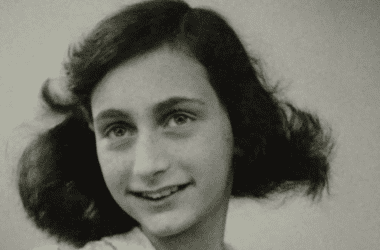 Image of a passport photo of Anne Frank for a blog post covering 10 interesting facts about Anne Frank.