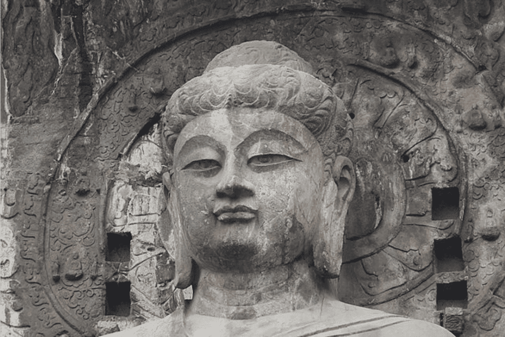 Image of an ancient Buddha statue in the likeness of Empress Wu Zetian.