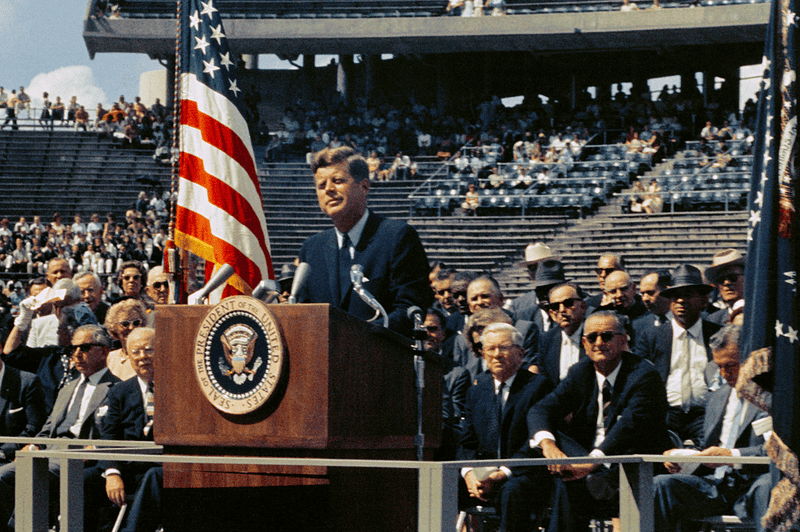 Image of JFK speaking at his inauguration in 1961 for a post providing a list of U.S. Presidents and party affiliated with.