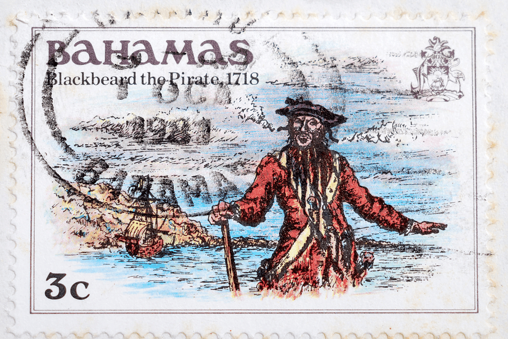 Image of the dreaded Blackbeard commemorated on a Bahamian postage stamp for an article covering 11 of history's most infamous pirates.