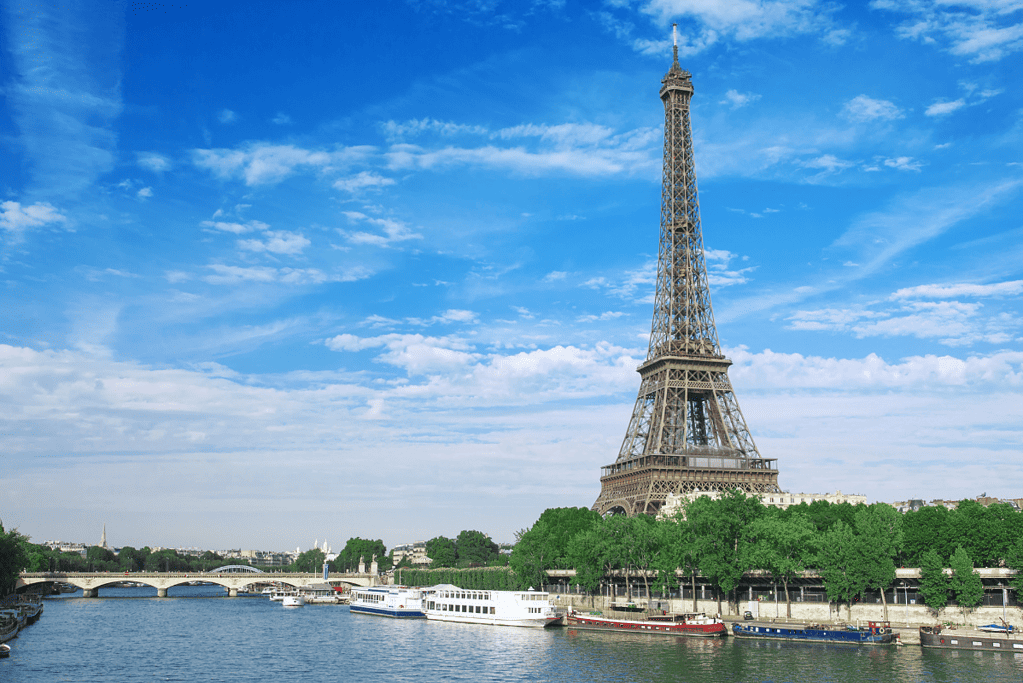 Image of the Eiffel Tower from across the Seine River for a blog post about the tallest buildings in history