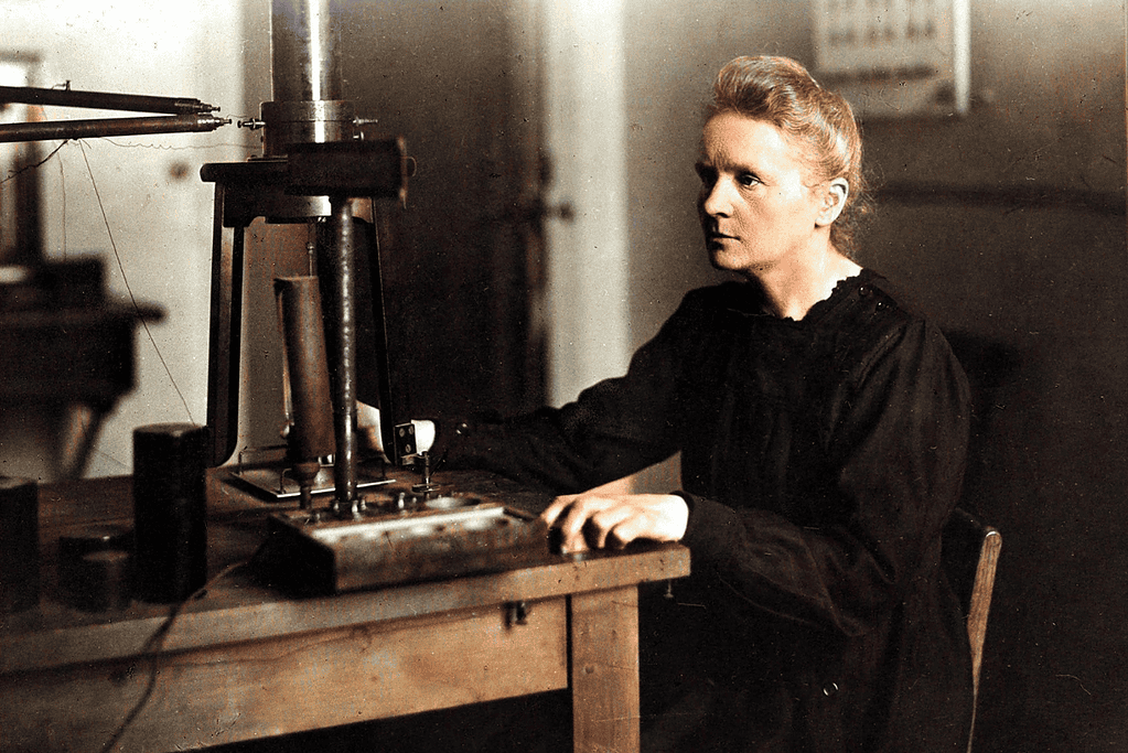 Image of Marie Curie working in her lab for a blog post covering fascinating facts about Marie Curie.