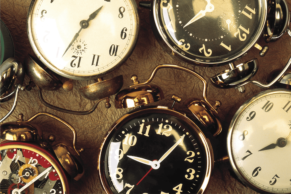 worlds-oldest-people-faqs Image of a collection of old clocks.