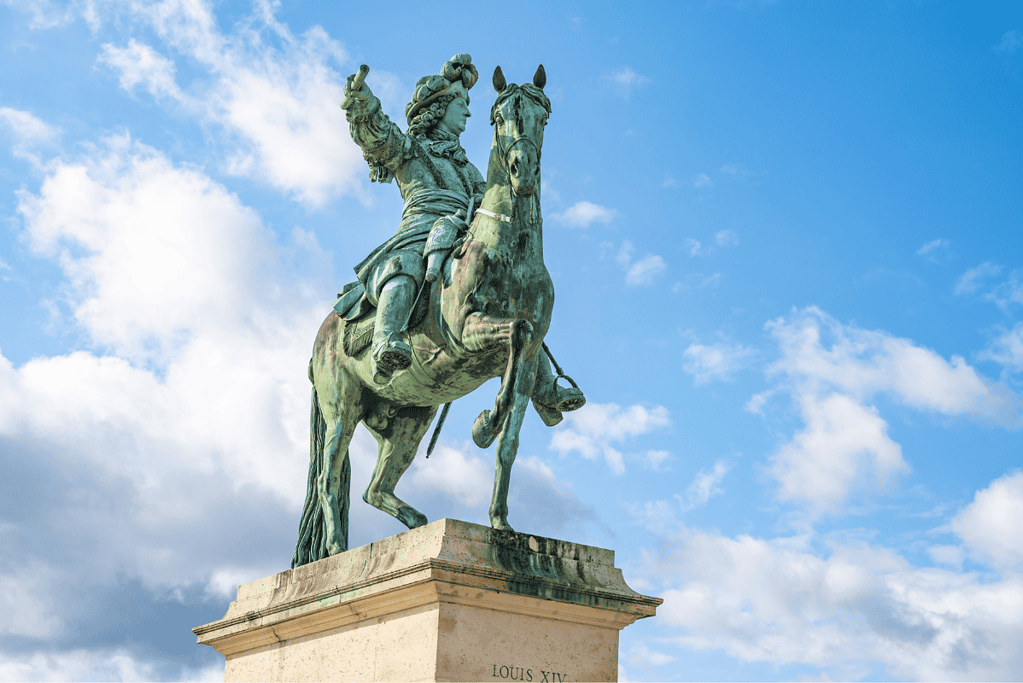 Image of a statue of French king Louis XIV on horseback for a blog post covering interesting facts about Louis XIV. 