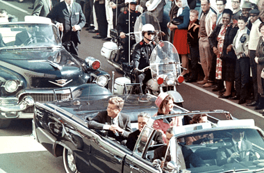Image of President Kennedy's motorcade in Dallas for a blog post covering famous conspiracy theories.