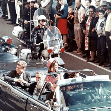 Image of President Kennedy's motorcade in Dallas for a blog post covering famous conspiracy theories.
