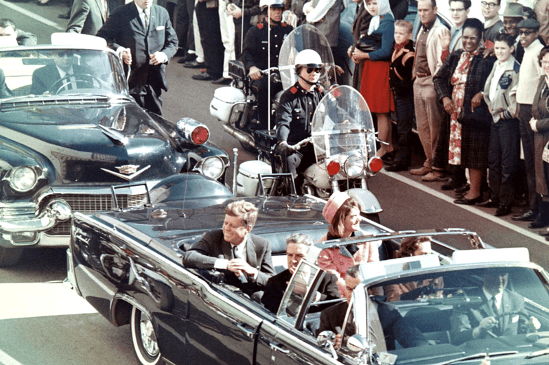 Image of President Kennedy's motorcade in Dallas for a blog post covering famous conspiracy theories.