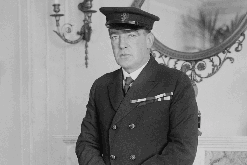 Image of Ernest Shackleton posing for a photo in full uniform.