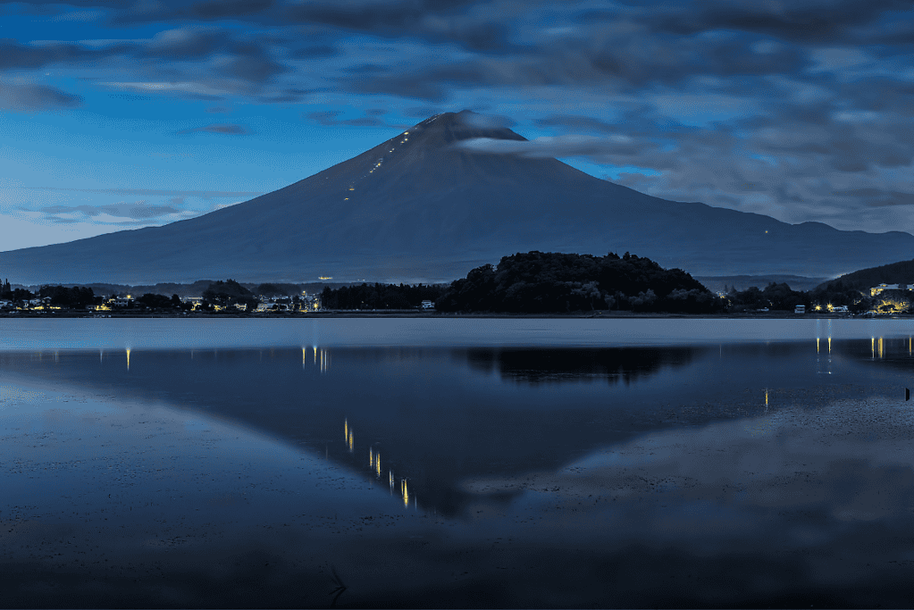 Image of Mount Fuji's nocturnal silhouette: Junko Tabei's first peak, defying asthma to reach new heights for a blog post covering interesting facts about Junko Tabei.