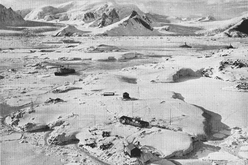 Image of a U.S. icebreaker opens up a route to the British station on Antarctica's Palmer Peninsula, 1959.