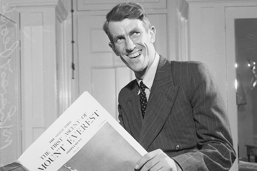famous-mountain-climbers-sir-edmund-hillary Sir Edmund Hillary reading about his ascent of Everest